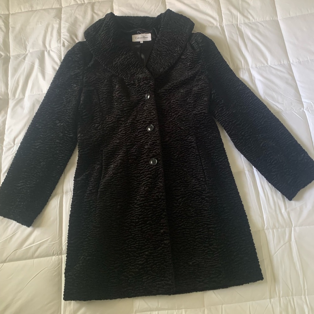 Calvin Klein black textured button down coat.